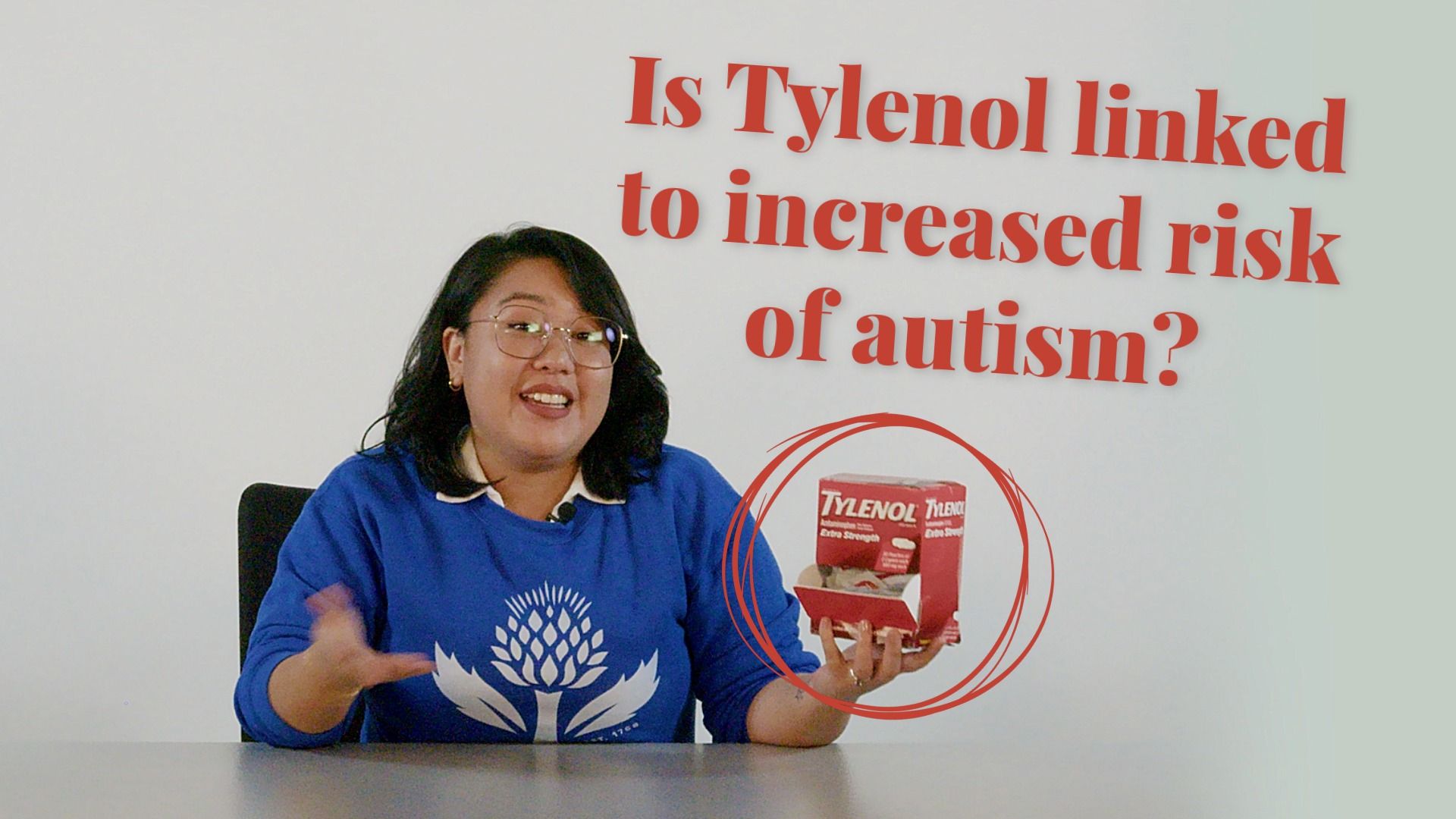 tigrinho 2 revenge demo - Person in Britannica sweatshirt at table holding a box of Tylenol; big red text reads, “Is Tylenol linked to increased risk of autism?”